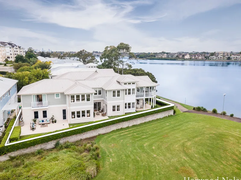 Luxury Waterfront Compound Set on over 634sqm of torrens title land with an enormous freestanding home and a private Marina Berth