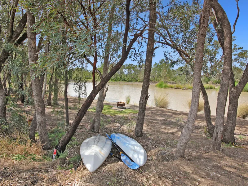 LOCATION! LOCATION!  WATERSIDE LIVING - YOU HAVE EXPANSIVE CREEK FRONTAGE- ENTERTAINMENT WITHOUT LEAVING HOME- Canoeing, bbq's by the water