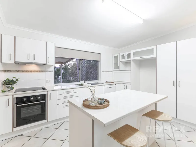 Well Presented Home on 796sqm - Elevated Views & Breezes, Big Yard & Convenient Location - Close to State Forest, City Buses, Shops & Schools