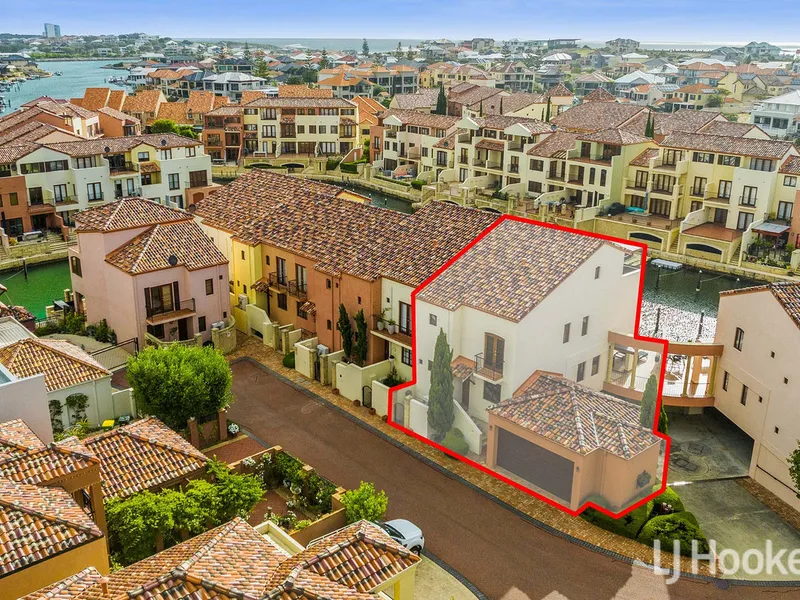 Uniquely Garaged Three Level Corner Villa With All The Extras In The Exclusive Gated Estate of Port Bouvard Island