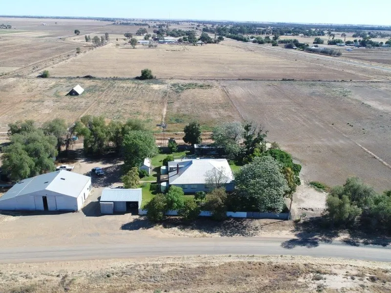 4 Bedroom Home with Plenty of Sheds on 18 acres!