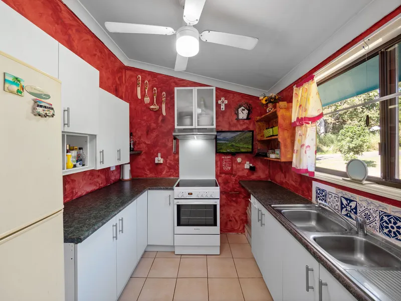 Welcome home to this lovingly decorated Mexican themed residence filled with enormous love and loads of passion.