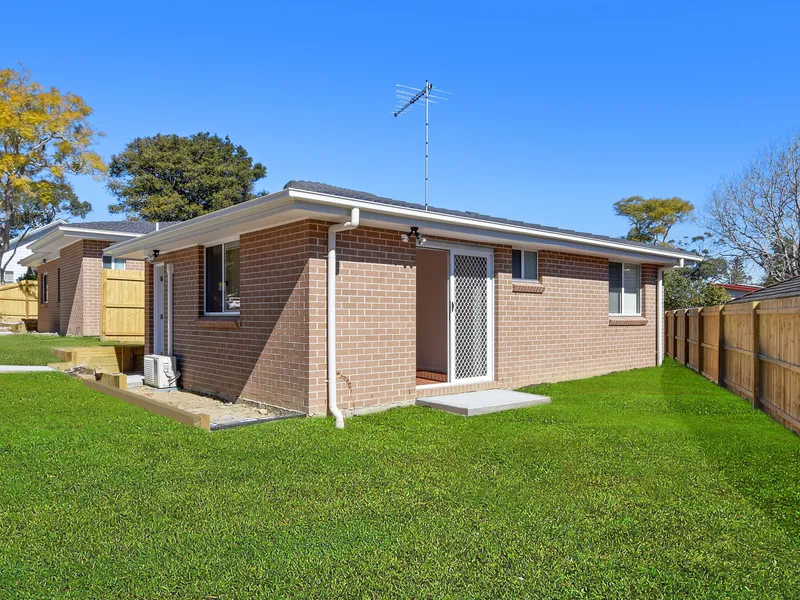 Near New Two Bedroom Single Level Home with Rear Yard