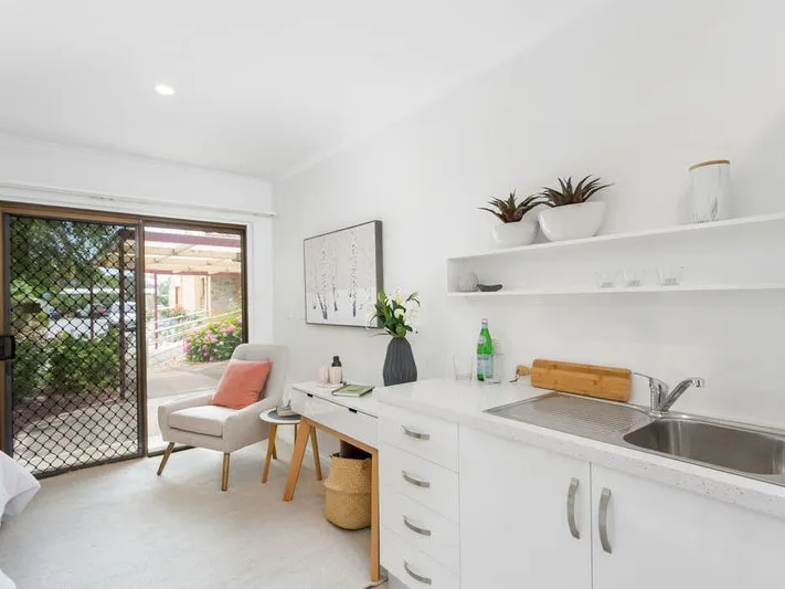 Refurbished unit with garden views