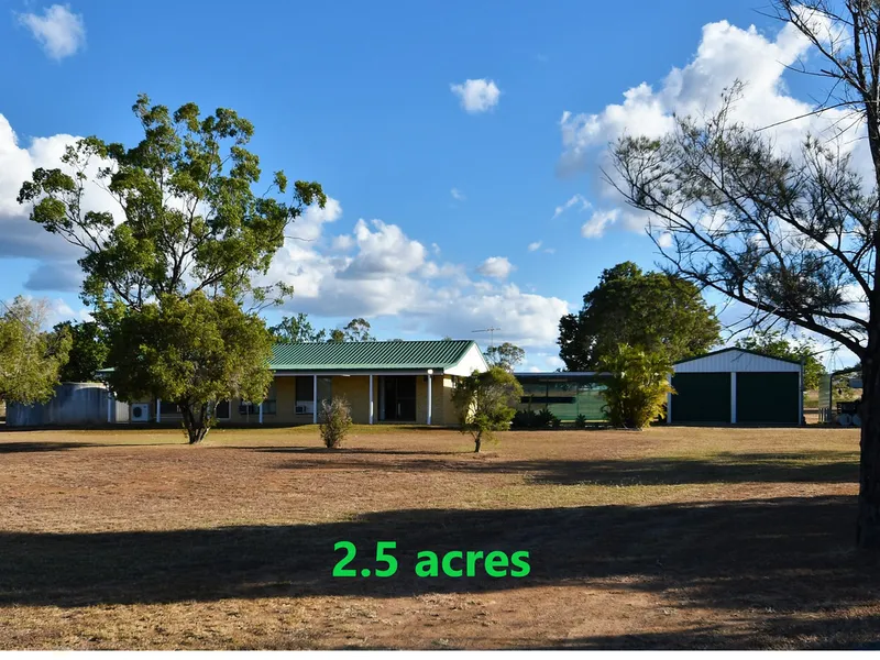 Lowset, level 2.5acres with sheds