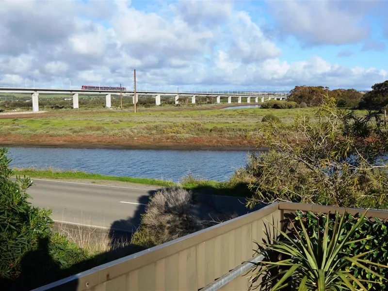 FULLY RENOVATED UNIT WITH RIVER FRONT VIEWS