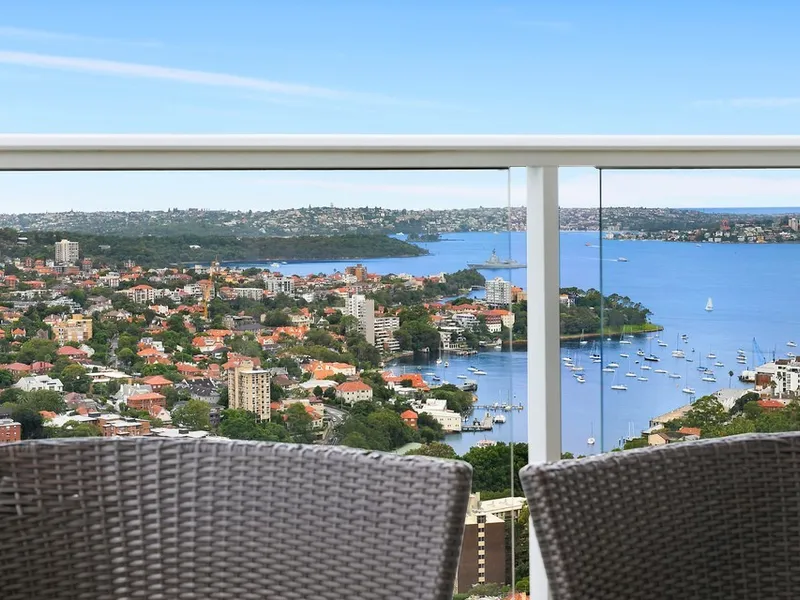 Indulge in a breathtaking panorama from this stylish city-fringe sky pad