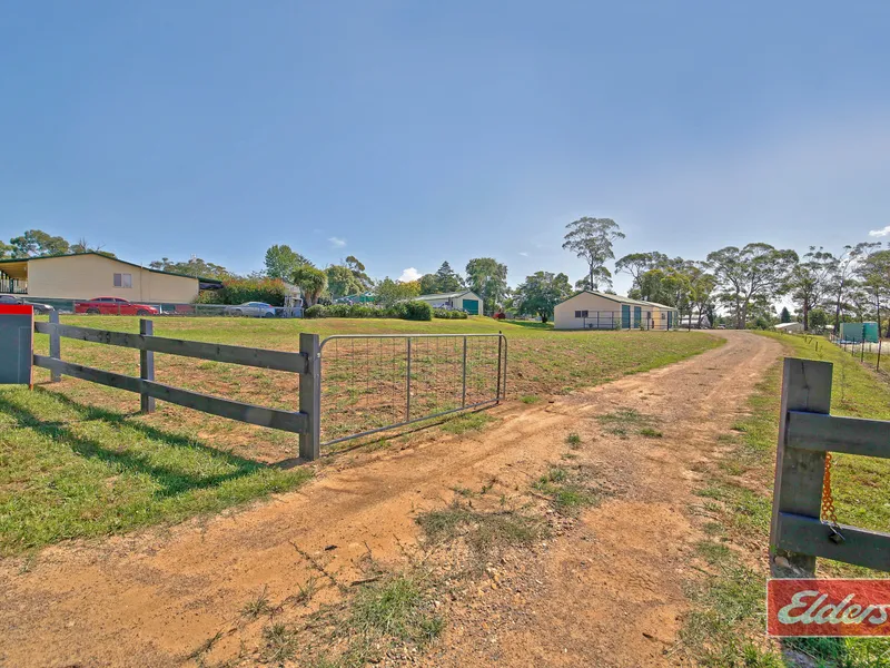 Super one acre with two superb sheds.