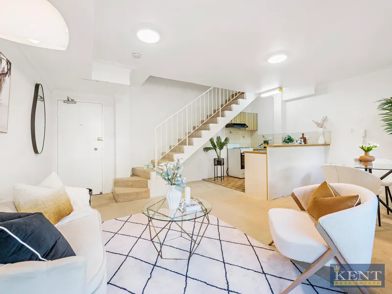 Comfortable Top-Floor Split-Level with Secure Parking in Prime Inner-City Location