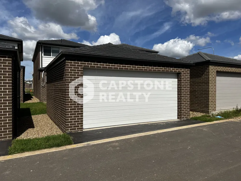 Spacious 4 bedroom house with DOUBLE GARGAGE available for lease.