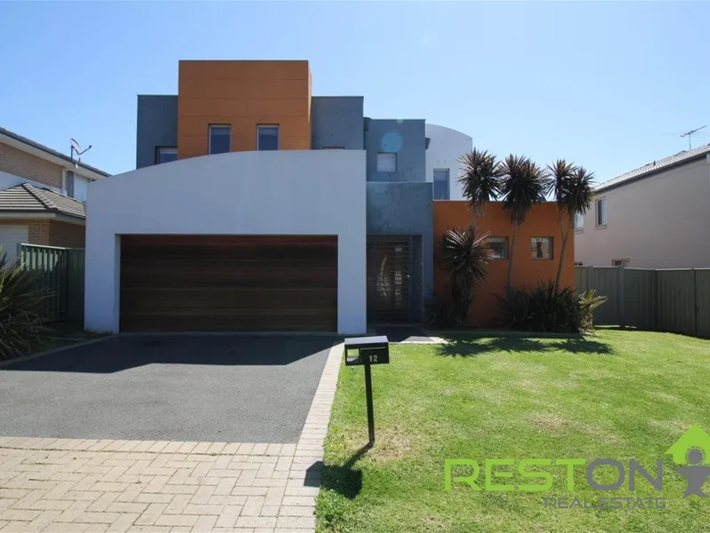 Ultra-Modern 4 Bedroom Home!