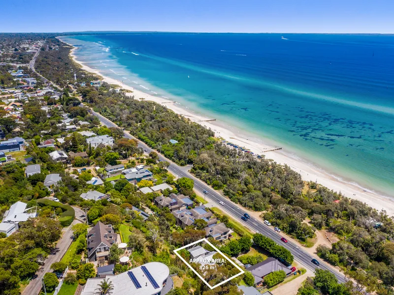 Sublime hillside family home by the bay