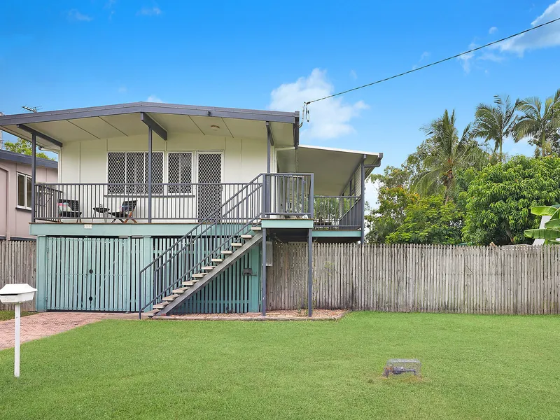 Centrally located high set home with spacious entertaining deck