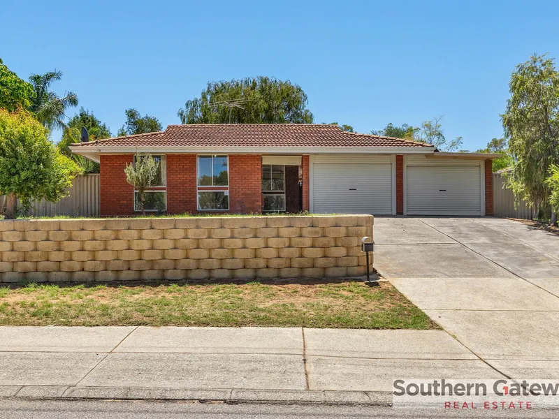 FAMILY HOME ON SPACIOUS ELEVATED BLOCK!