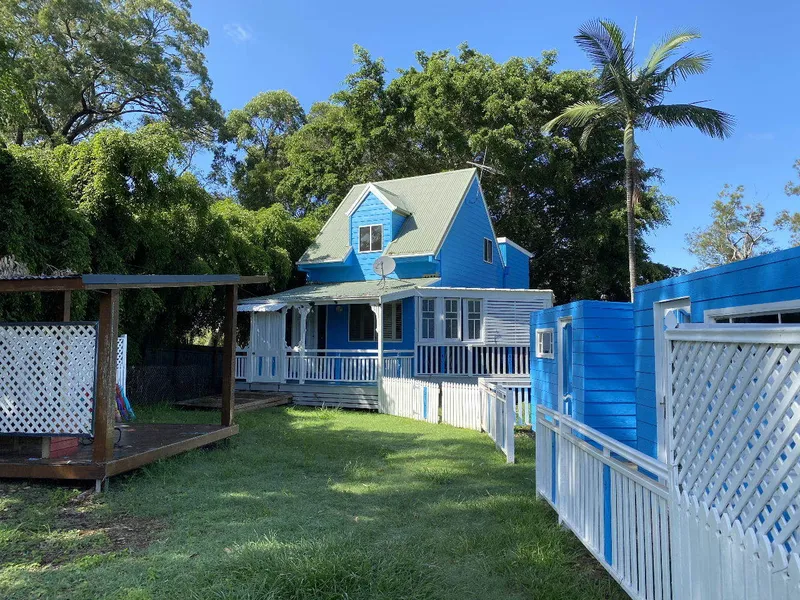 Beautiful cottage on fully fenced block a short walk to the jetty with options for possible work from home space
