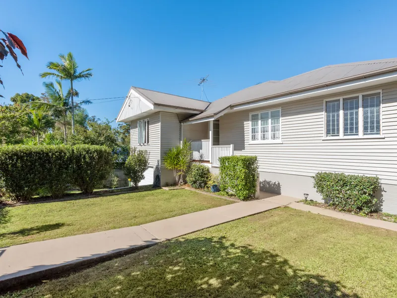 BEAUTIFULLY RENOVATED 3 BEDROOM HOME WITH PEACEFUL OUTLOOK FROM ELEVATED ENTERTAINMENT DECK