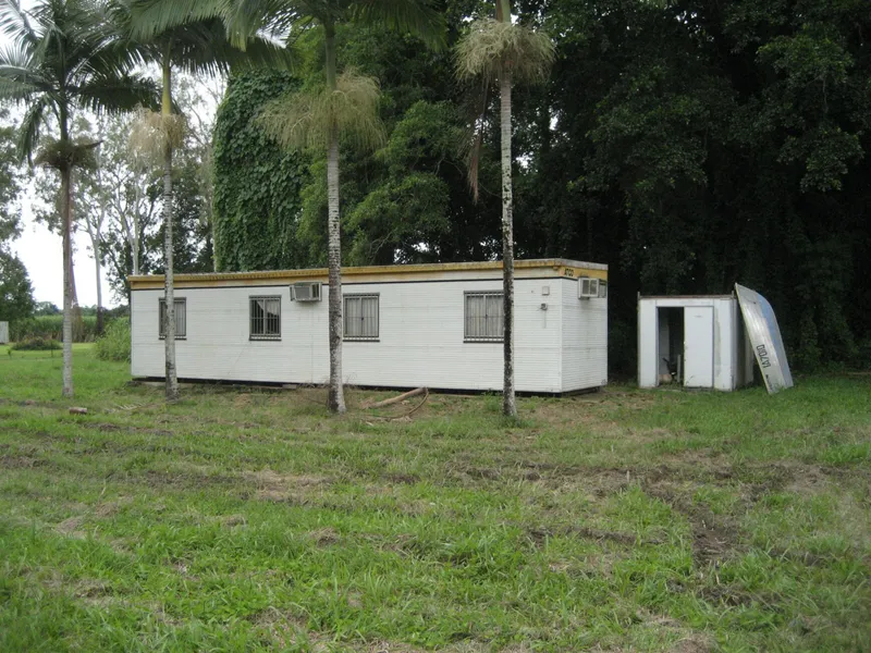 Weekender with creek frontage; power and water...