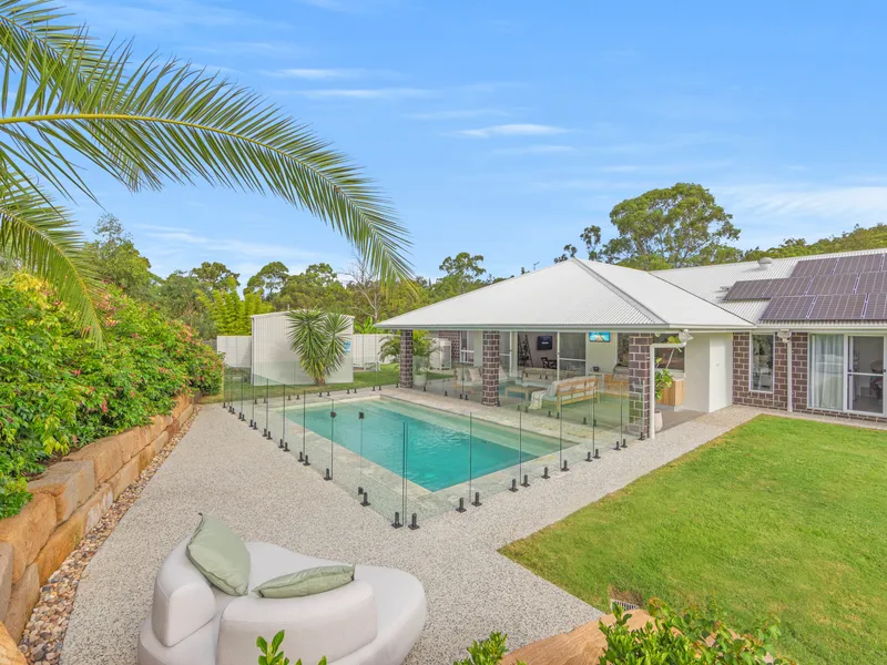 EXCEPTIONAL SINGLE-LEVEL ENTERTAINER ON TRANQUIL ACREAGE