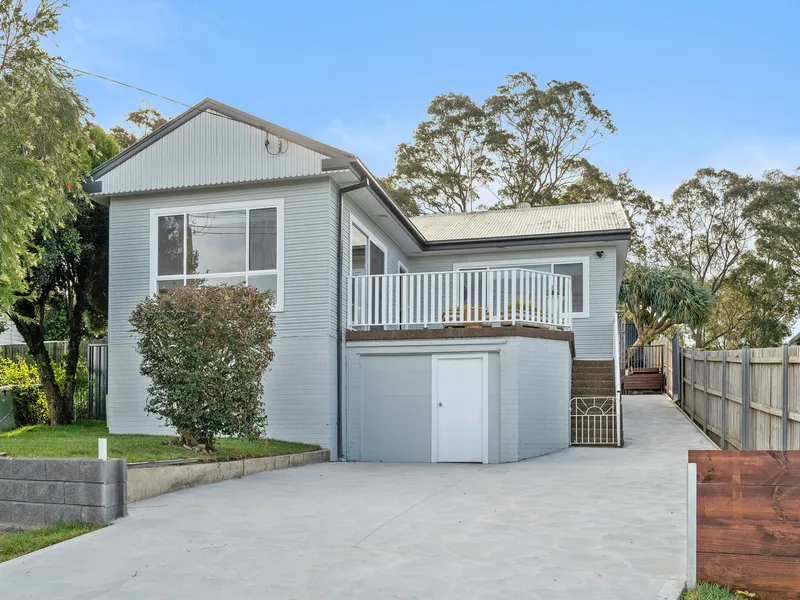 FULLY RENOVATED HOME WITH LAKE VIEWS