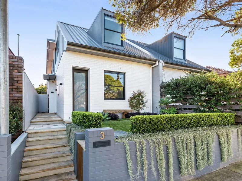 Architect designed near-new duplex of space, light and style