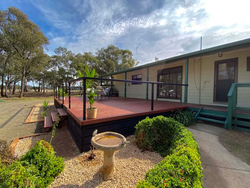 Beat the building delays spacious updated 3 bed 2 bath ranch home on 5.5 acres with views over the Bealiba ranges (with development potential)