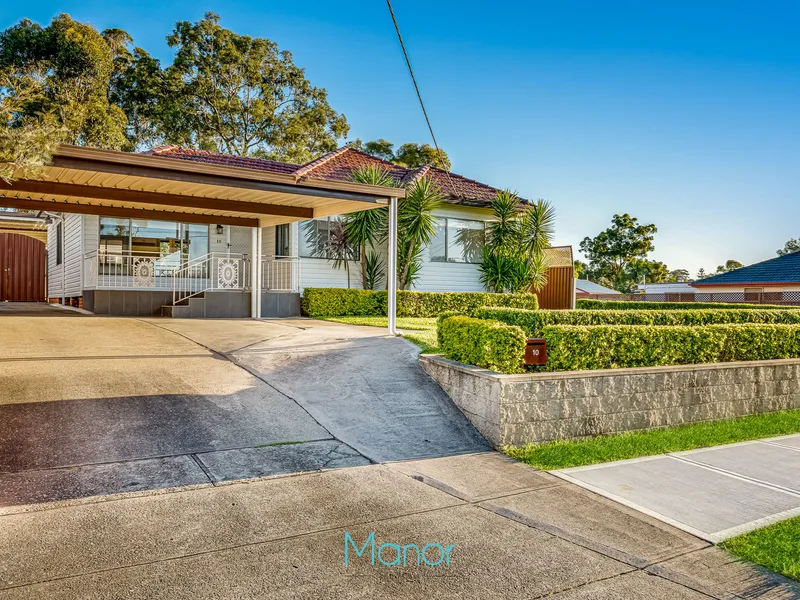 Single level residence with separate studio/home office