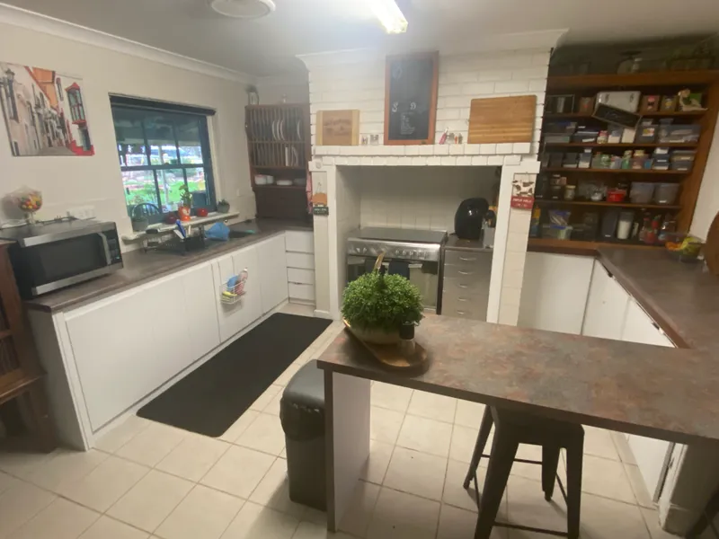 5.6 acres - character home- big sheds- stables-affordable