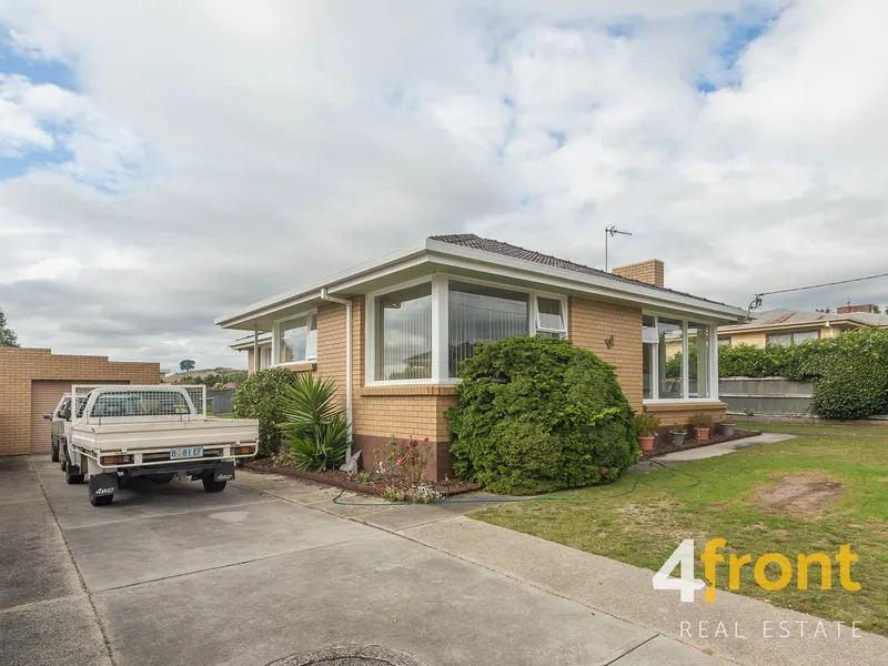 Neat brick home on flat block