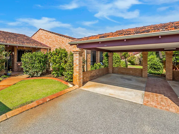 Freshly updated home with appealing, flexible floorplan, situated in a lovely garden setting