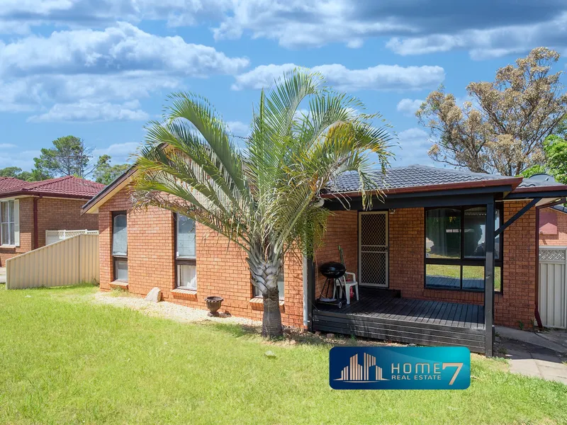 PROPERTY WITH STUDIO GRANNY FLAT. 25 Benham Road Minto NSW 2566.