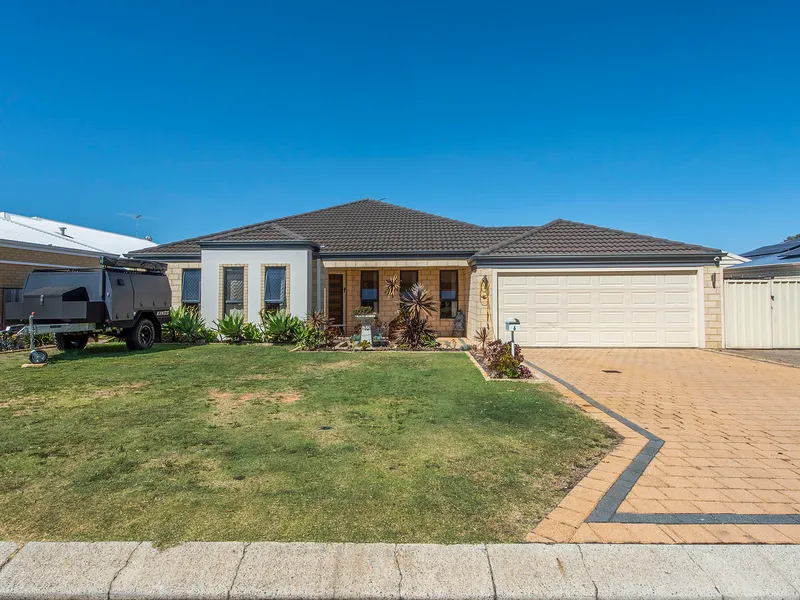 FAMILY HOME WITH PLENTY OF ADDED EXTRAS