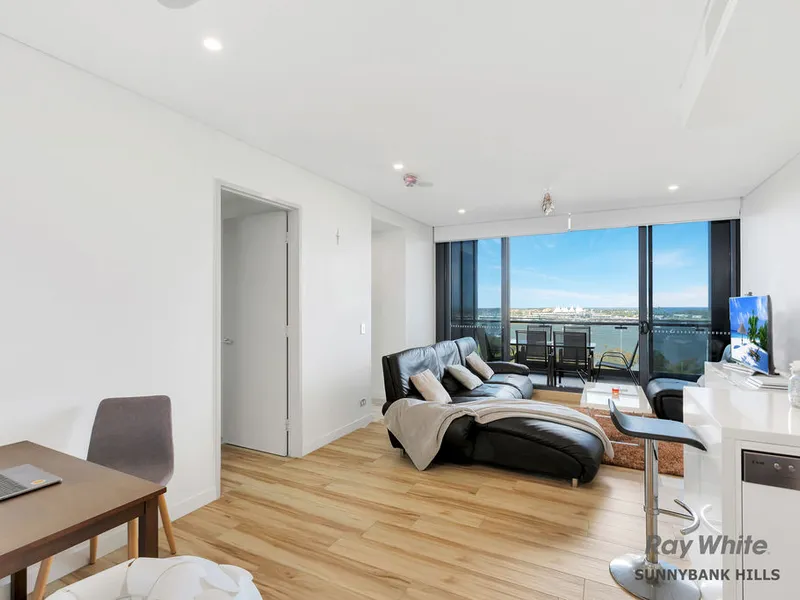 HIGH-RISE LIVING WITH OCEAN VIEWS!