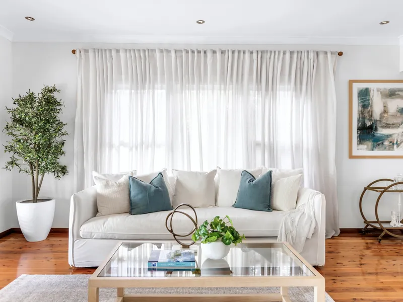 Commanding a high set position in a peaceful cul-de-sac, enhanced by elevated leafy outlooks