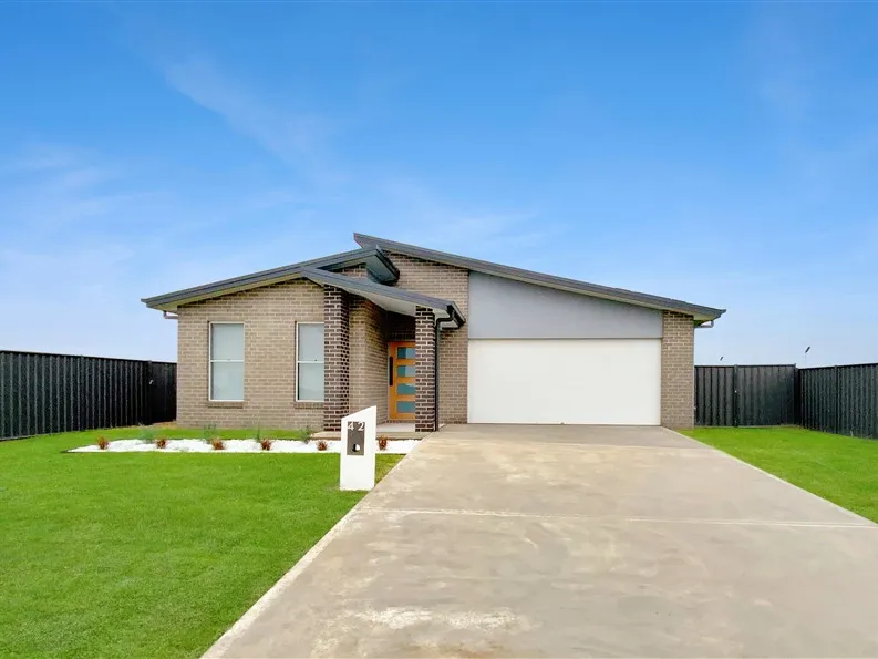 Spacious 4-Bedroom Home with Office and Multiple Living Areas!