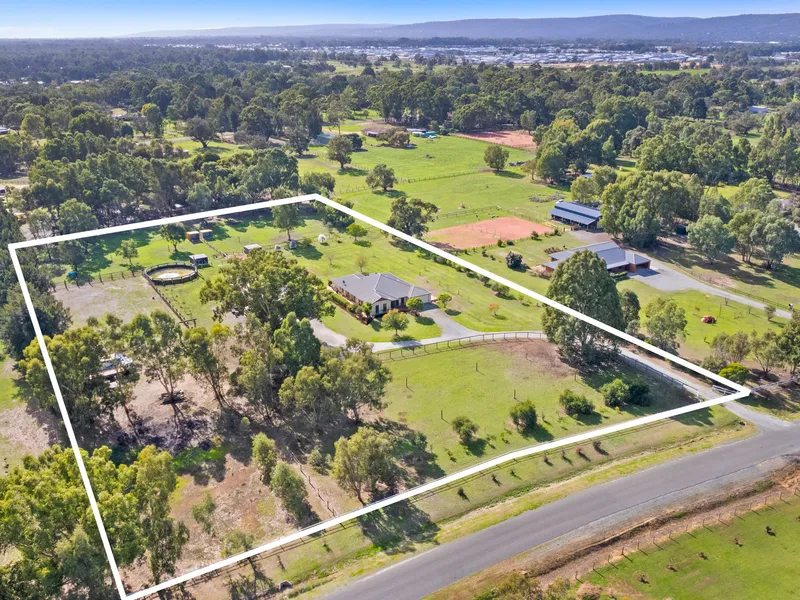 Expansive home on excellent equestrian acreage