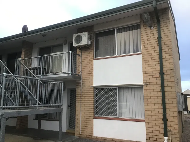 Central Location - 2 bedroom unfurnished unit with security screens