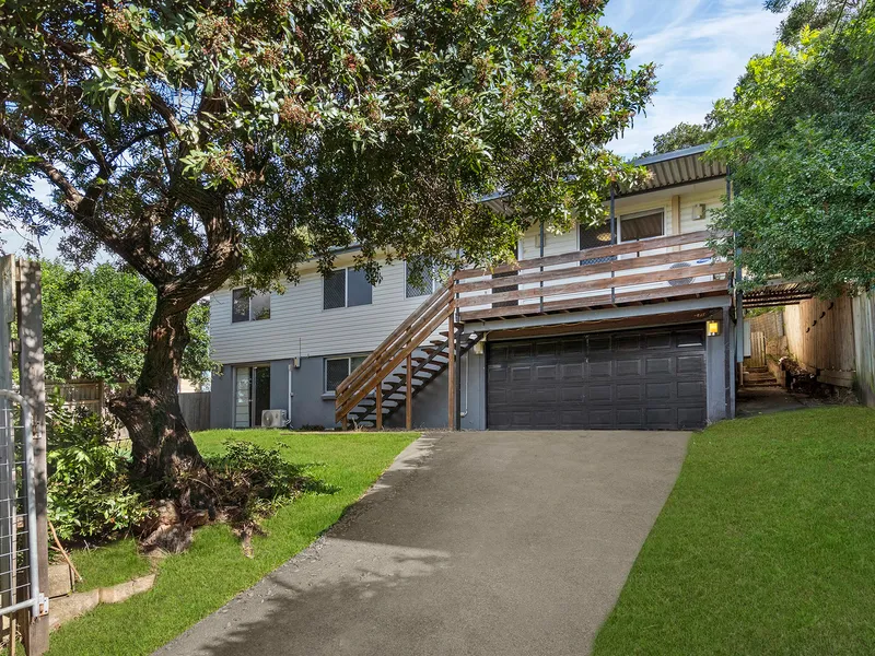 Multiple Living Areas, Air Conditioning and Large Yard