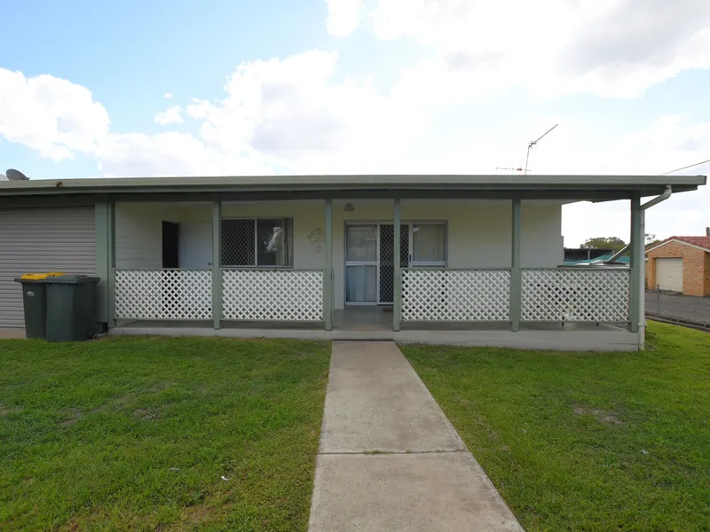 Neat Family Home with Large Backyard!