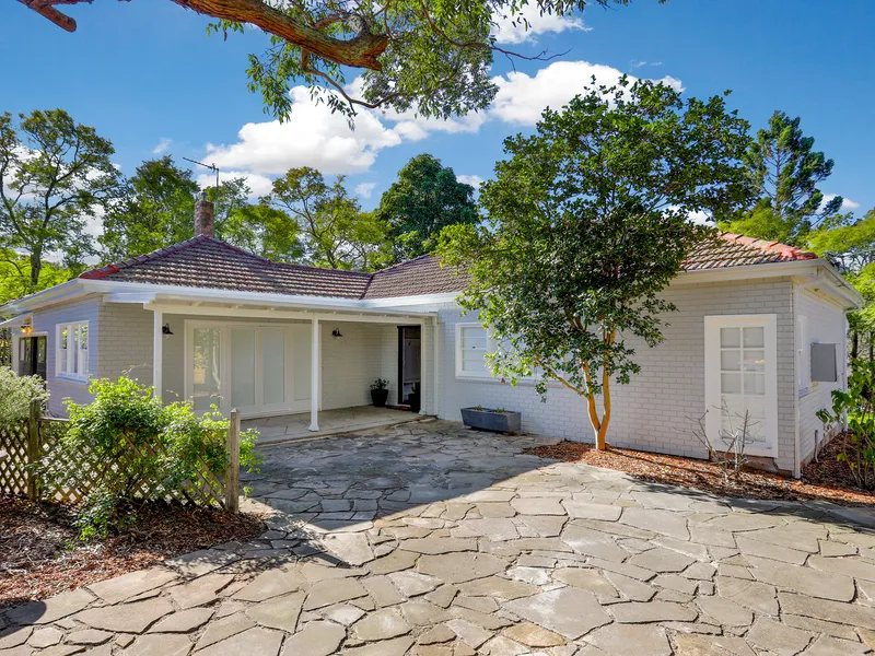 CHARACTER FILLED HOME IN A PEACEFUL RURAL SETTING!