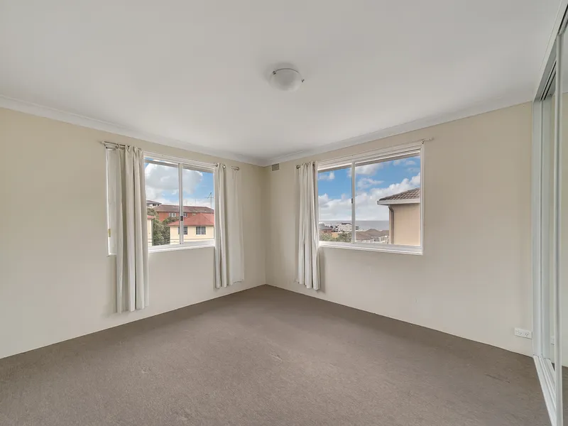 Two bedroom beachside apartment with parking space and secure entry