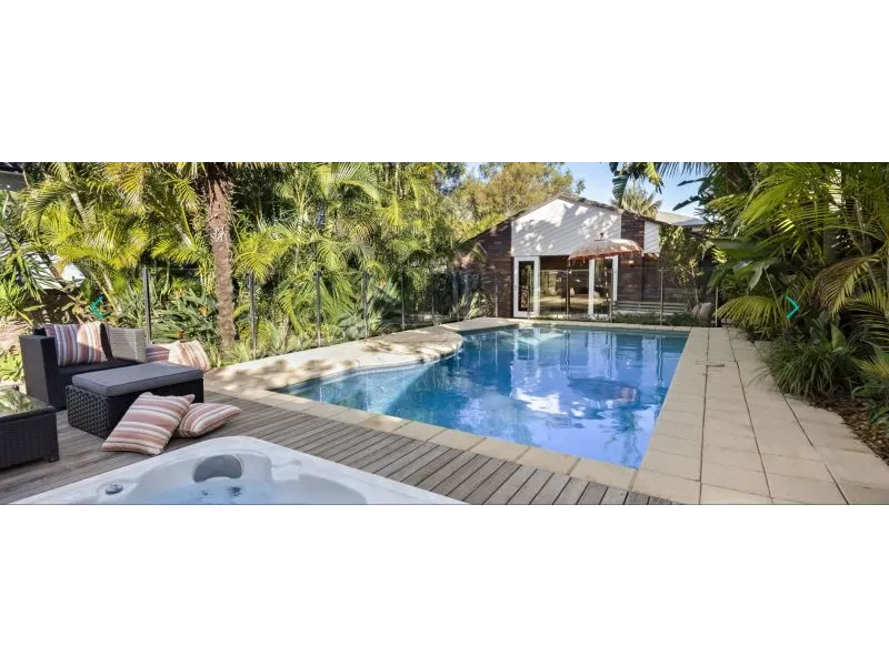 Resort Style Tropical Oasis with Pool & Spa