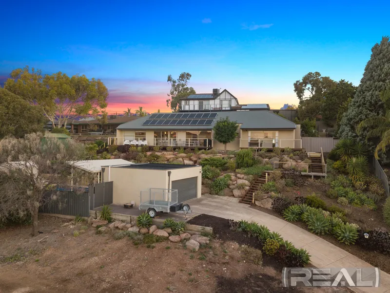Make spectacular sunsets the backdrop of your life and this remarkable residence your very own
