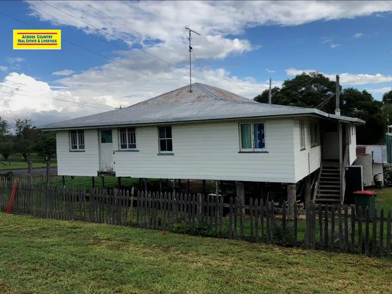 PARTLY RENOVATED HOME ON A CORNER BLOCK