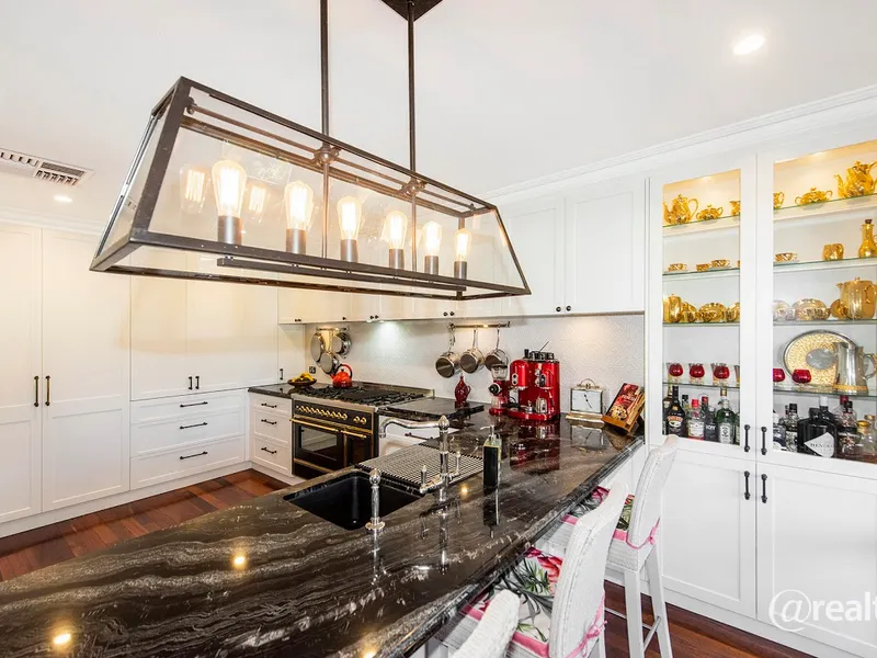 River views, dream kitchen, 5 bed 3 bath home on large block! 