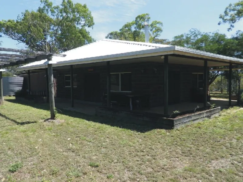 GETAWAY FROM IT ALL WITH THIS QUALITY BLOCK HOME !