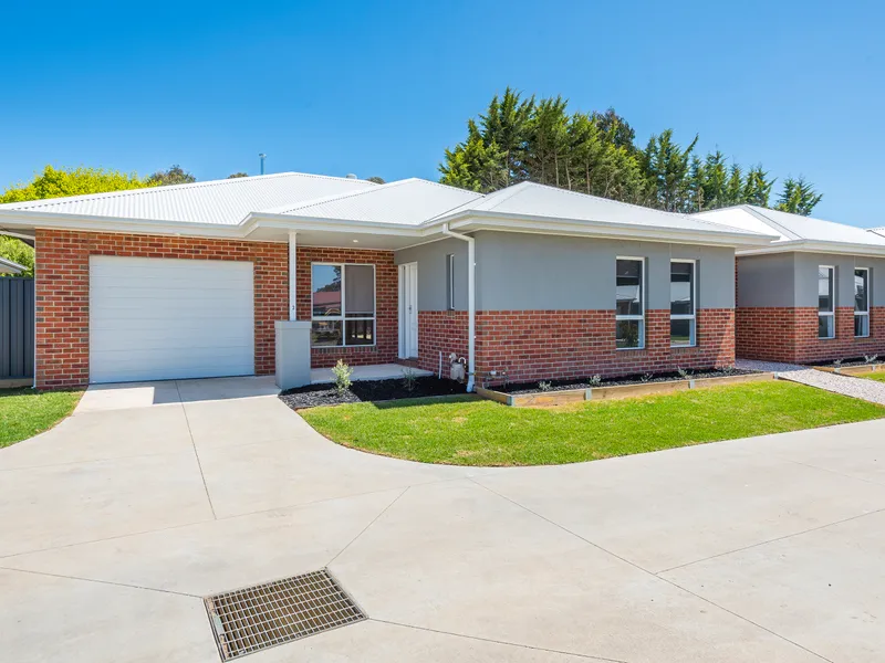 Ideal Location, Stylish Design, and Low Maintenance Living