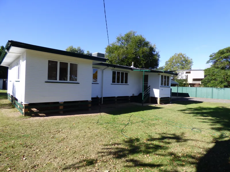 4 BEDROOM HOME WITH WELL FENCED YARD