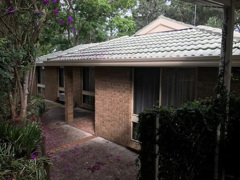 Single-level home with leafy surrounds