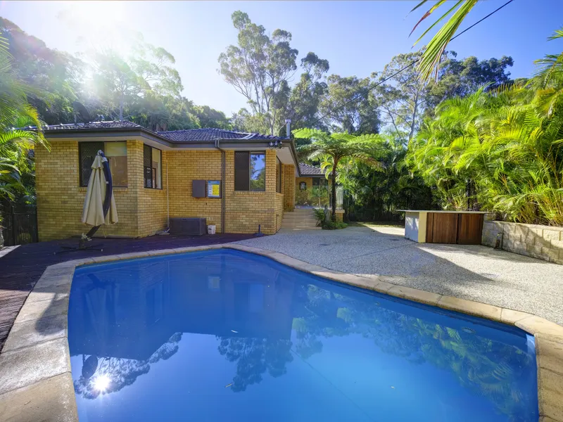 Solid, spacious brick home + pool adjoins reserve