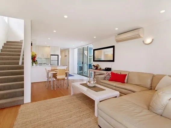 Fully furnished two level apartment directly across from the beach! 